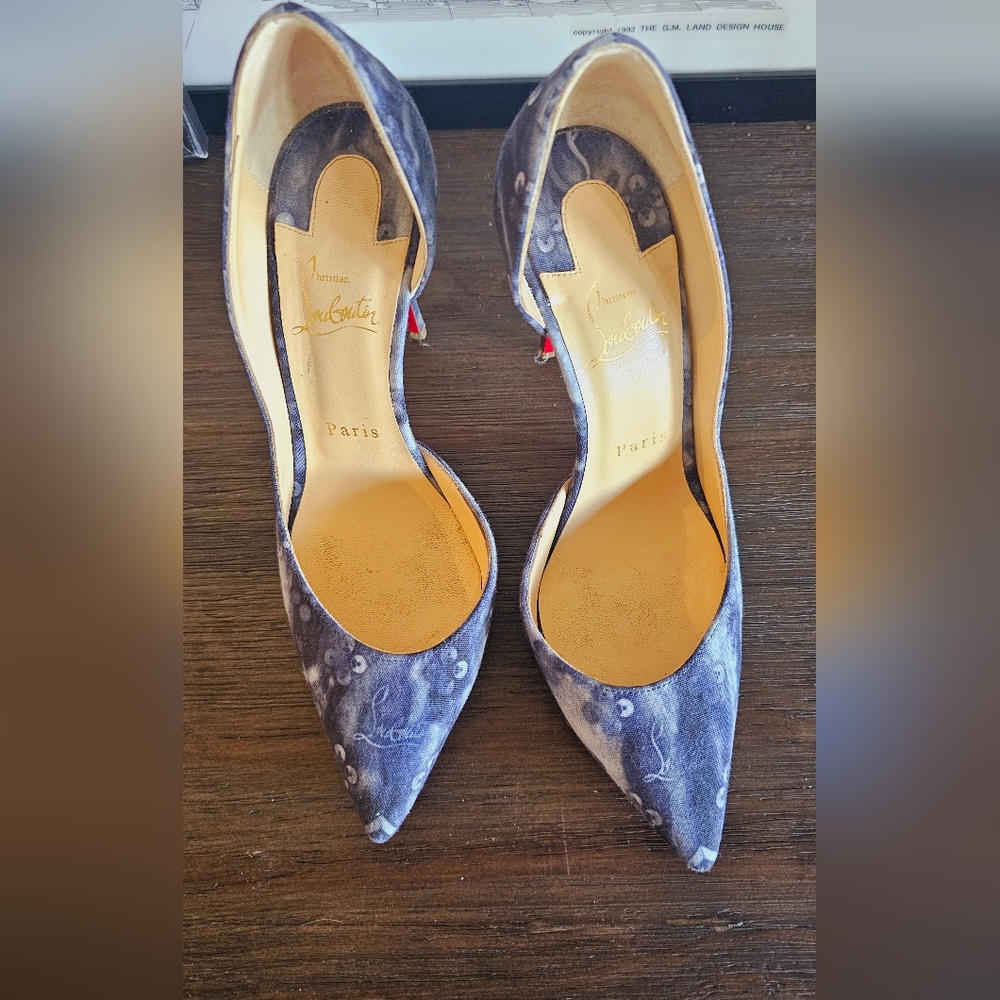 Christian Louboutin “HALL LOGO” blue canvas pumps.